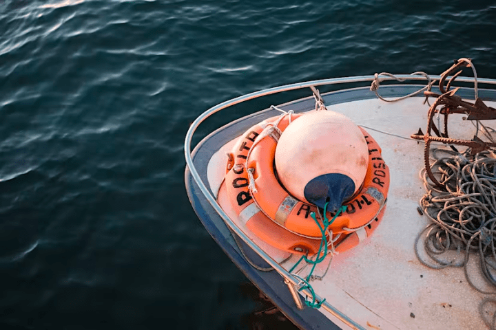a small boat in a body of water