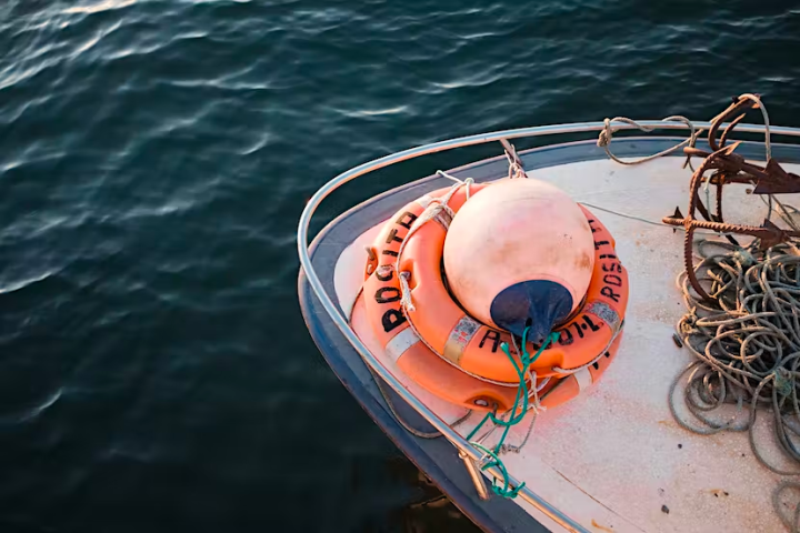 a small boat in a body of water